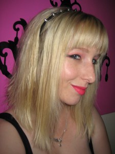 A metal spiked headband adds a bit of biker chic. 